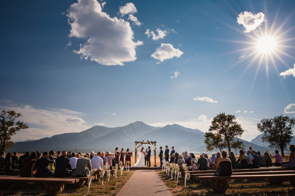 A Colorado ceremony under a blue sky.